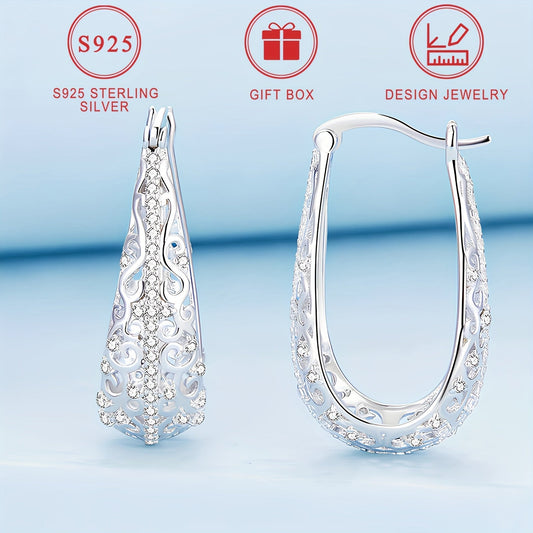 Pair of large earrings weighing approximately 3.4g with 925 pure Silver, boasting a low allergy level. These elegant earrings feature a female Zirconia flower pattern, electroplated with luxurious 18K Gold. A fashionable and exquisite piece of jewelry