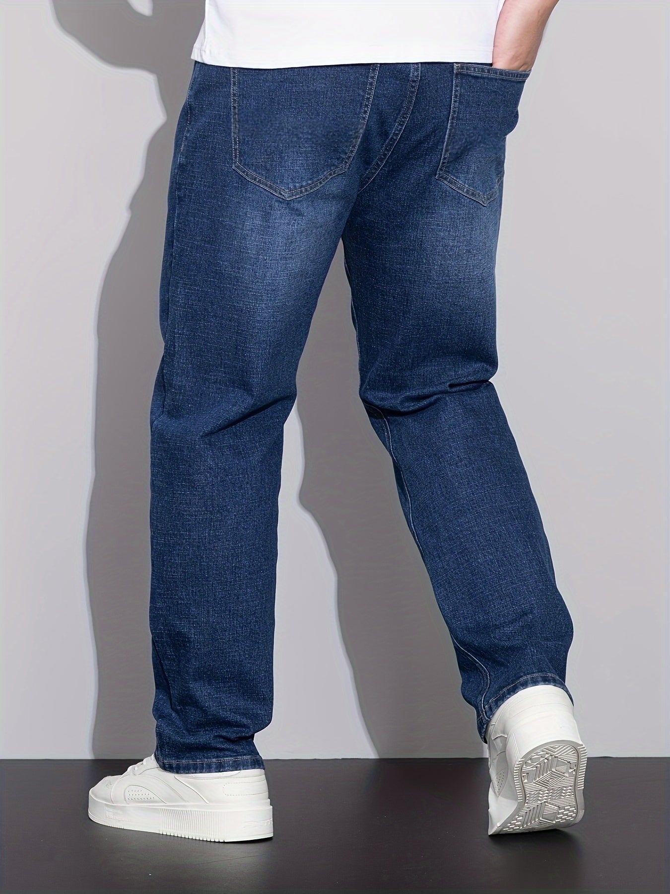 Cotton denim jeans for men in plus sizes, designed for comfort in all seasons with a regular fit.