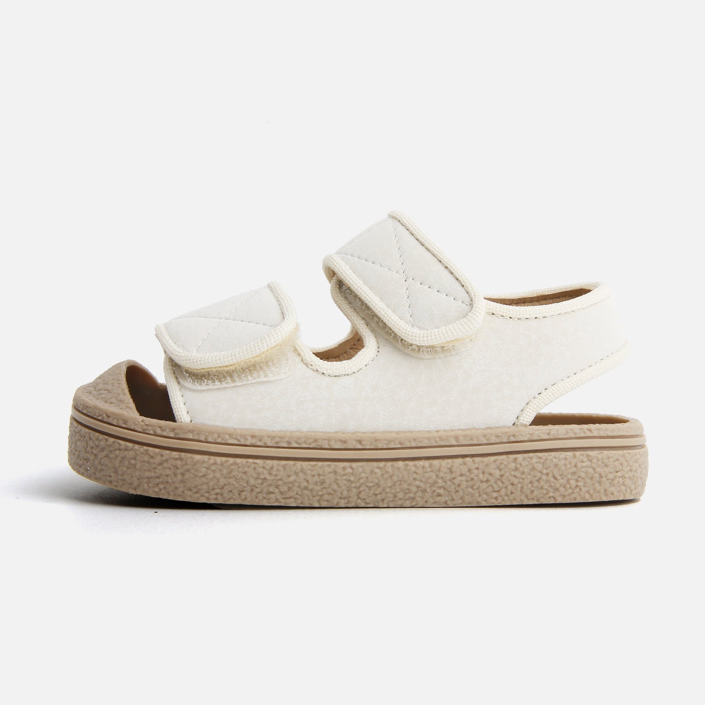 Kids' breathable open-toe footwear with hook-and-loop closure, perfect for beach and leisure activities.