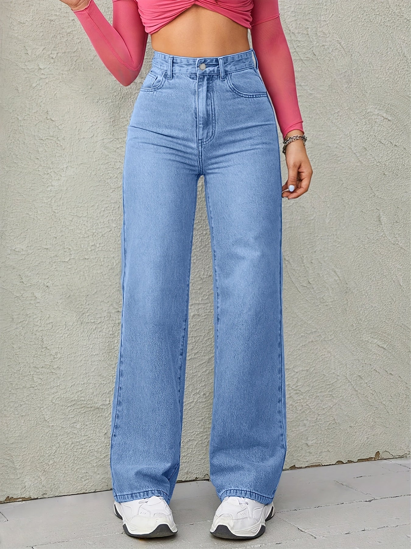 Sky blue wide leg jeans for women with high waist, loose fit, and medium elasticity.