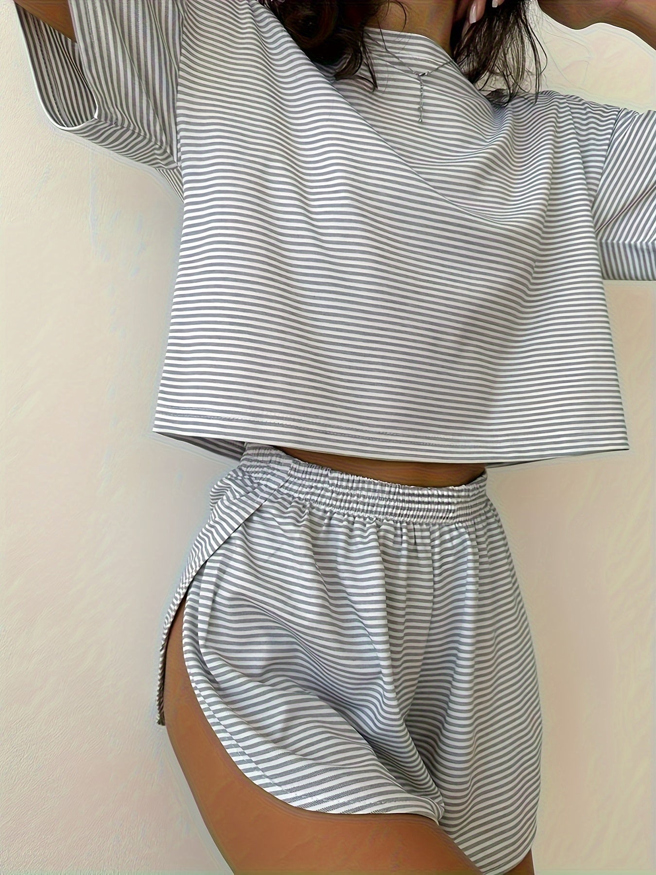 2-piece women's casual pajama set includes striped knit top with side split and coordinating shorts, perfect for year-round sleepwear.