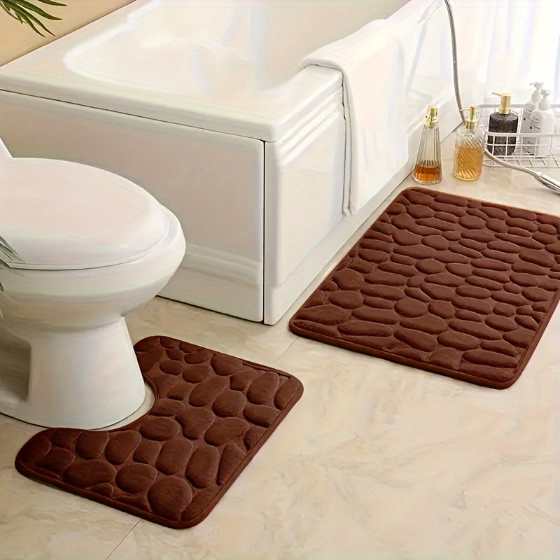 Soft and comfortable two-piece bathroom mat set with anti-slip, absorbent pebble memory design. Perfect for your toilet floor.