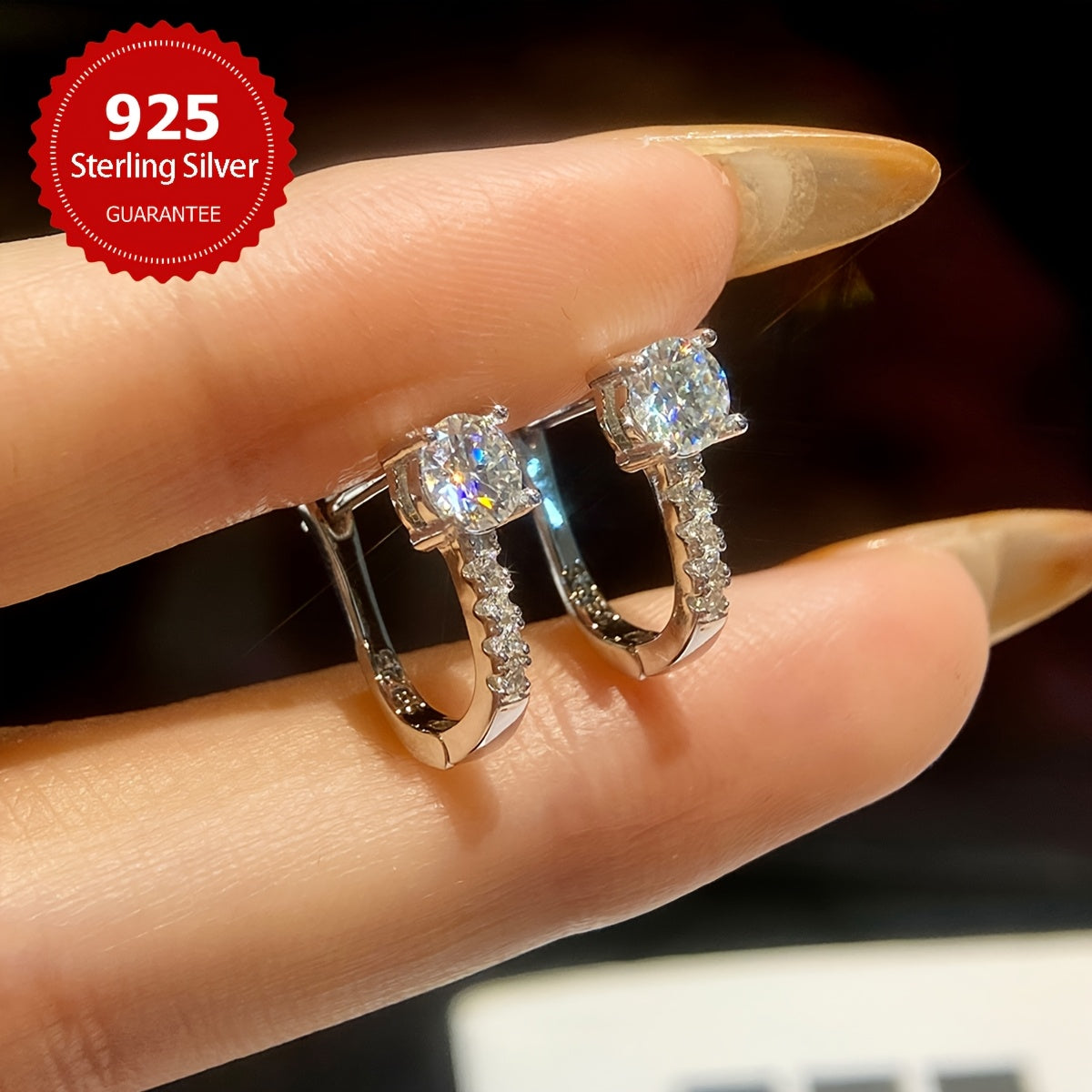 These elegant U-shaped earrings feature 1CT shiny moissanite stones set in 925 sterling silver. They make a perfect Valentine's Day gift and are ideal for weddings. With a luxurious and noble design, these earrings weigh approximately 2.4 grams and each