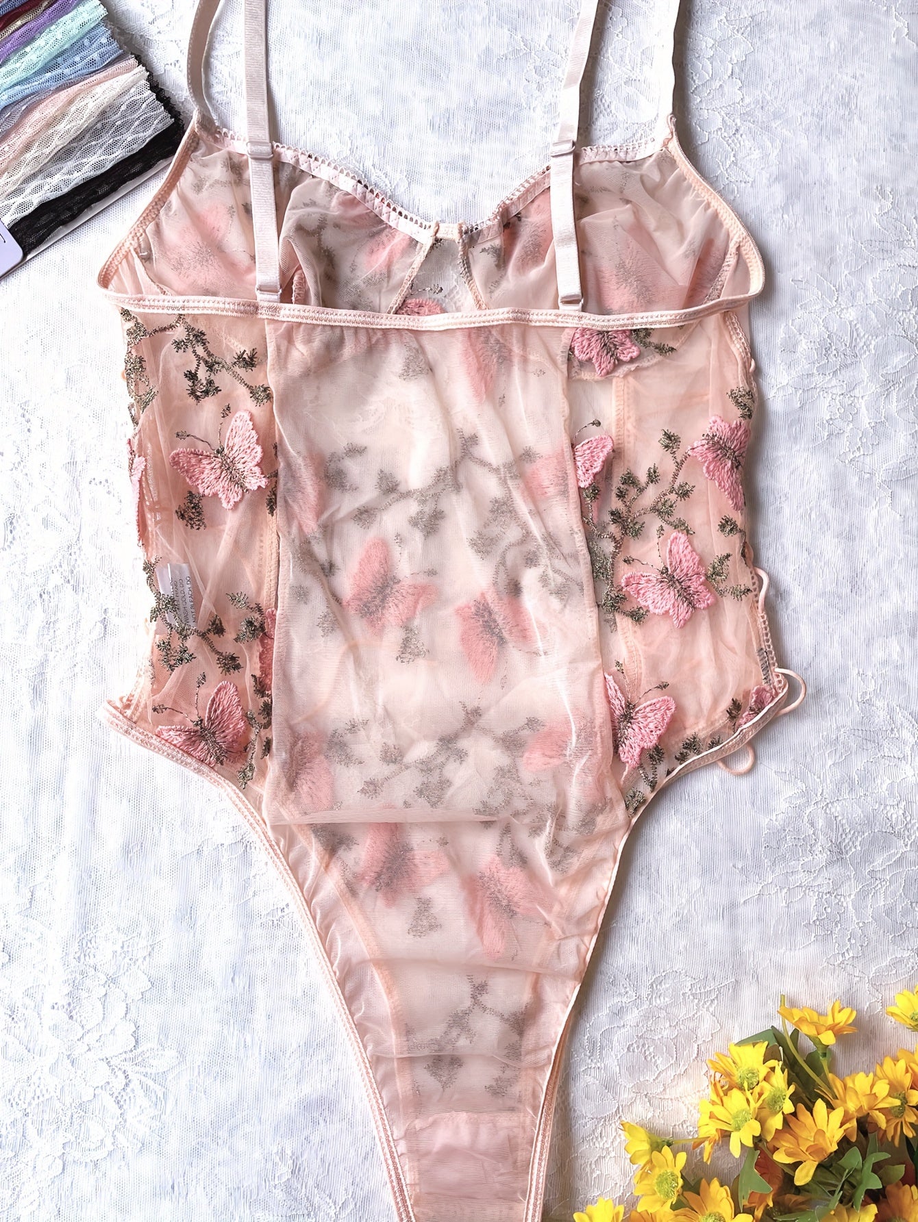 Strappy teddy and backless slip bodysuit with butterfly embroidery for women's sexy lingerie.