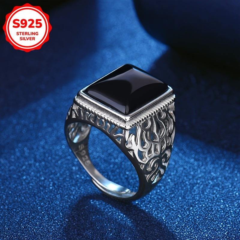 This bold and stylish open ring features a domineering and generous design, with a striking black onyx and hollow imitation jade pattern. Made from 5g of high-quality 925 silver, this ring is suitable for daily wear or for special occasions such as