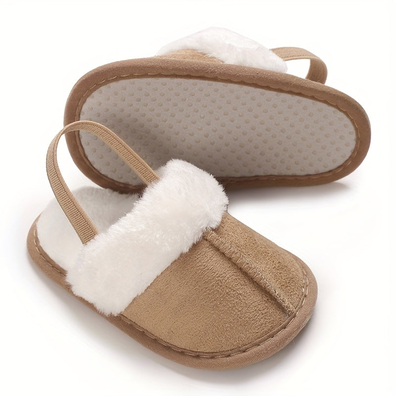 Soft and cozy plush baby girl slippers with non-slip sole for indoor comfort, perfect for 0-1 year olds in spring and fall.