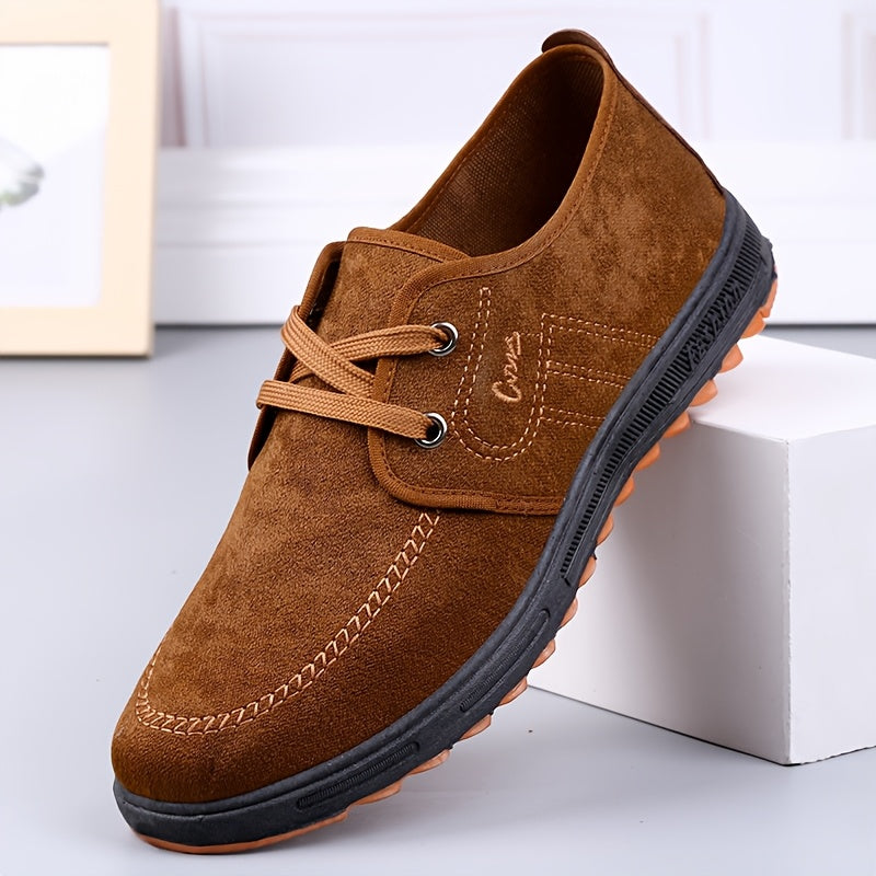 Comfortable men's slip-on canvas shoes in solid colors, ideal for outdoor activities.