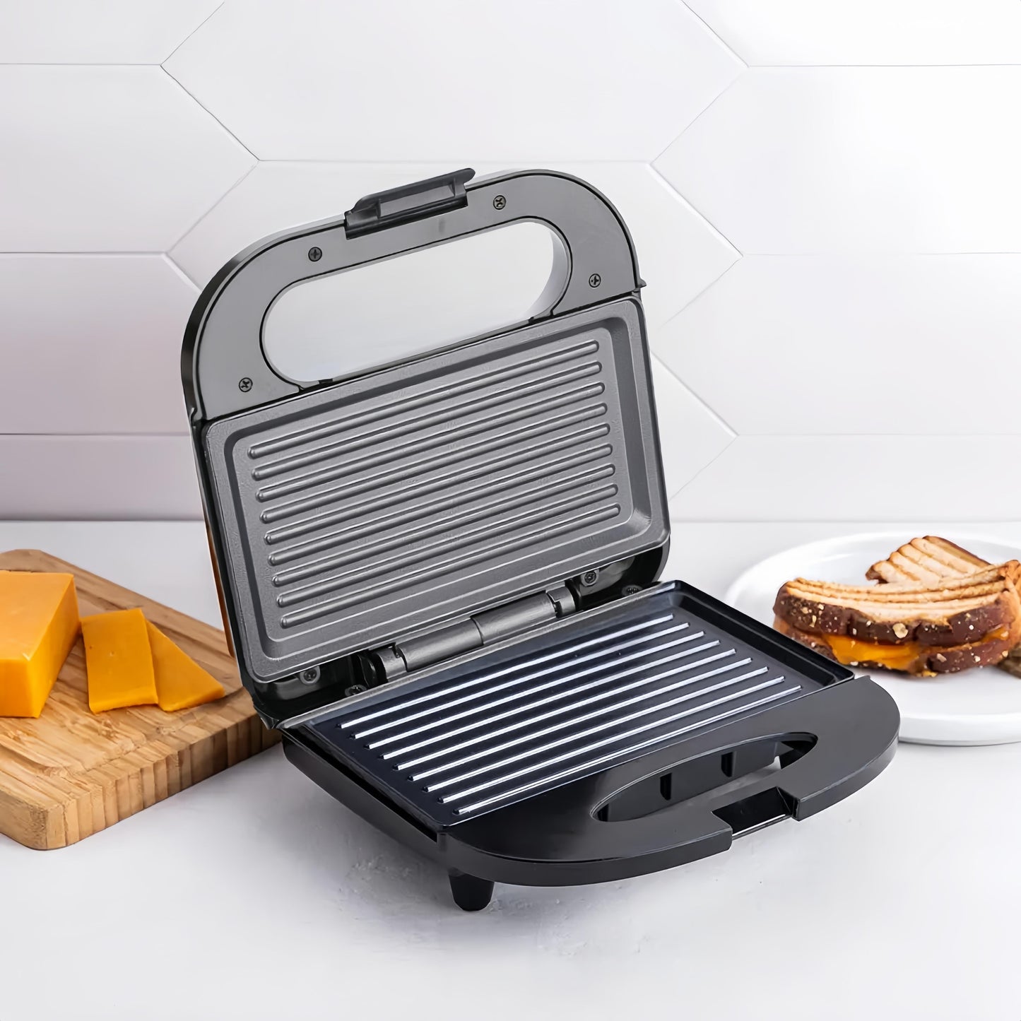 Double-sided 750W sandwich maker with non-stick coating, easy to clean. Ideal for toast, waffles, and veggies. 220-240V US plug.