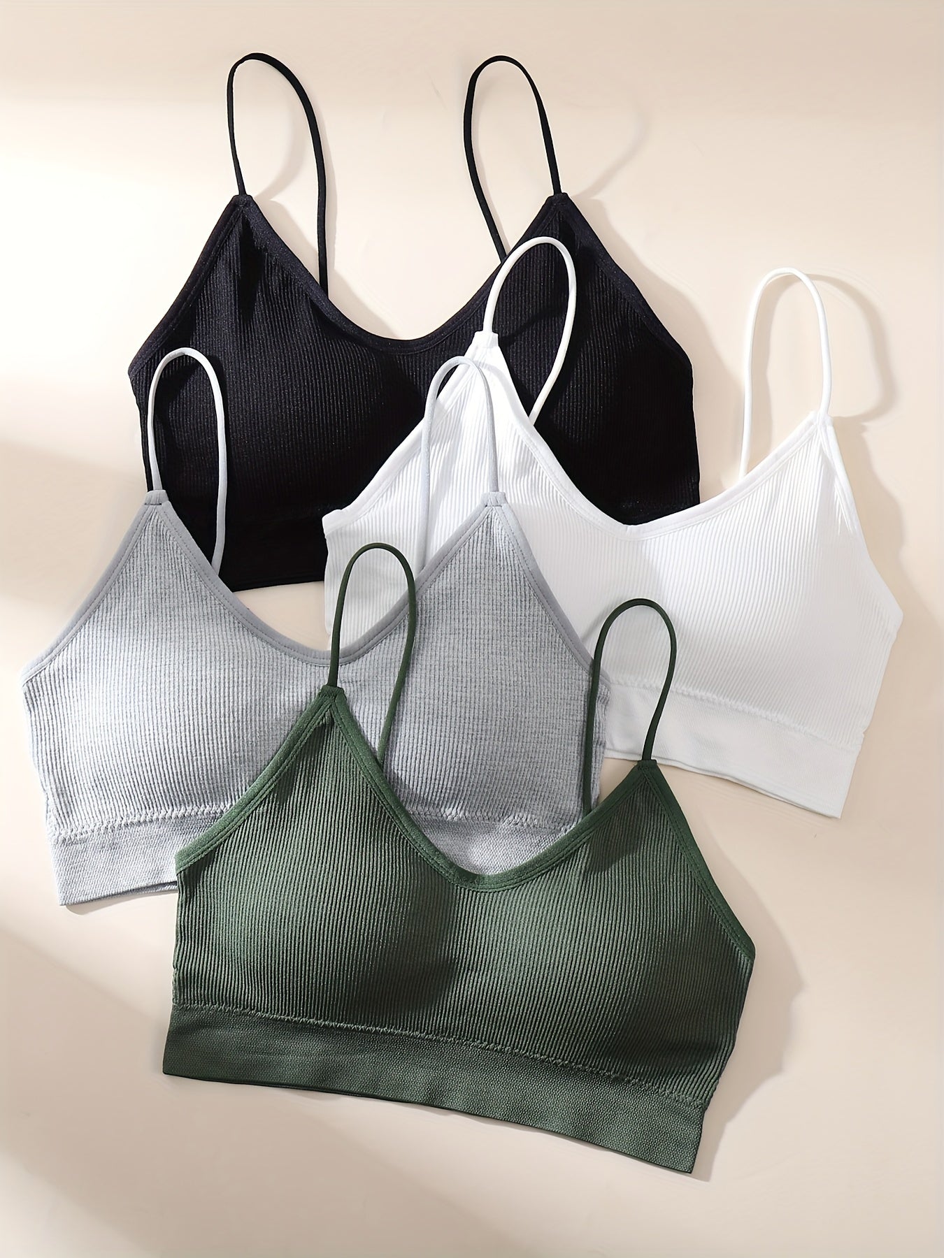 Set of 4 wireless ribbed bras for women, simple and comfortable intimate lingerie.