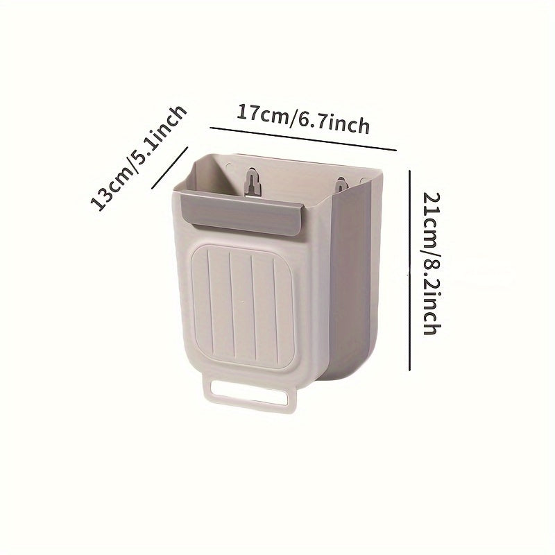 Thickened, foldable kitchen trash can hangs inside cabinet for storage without bending.