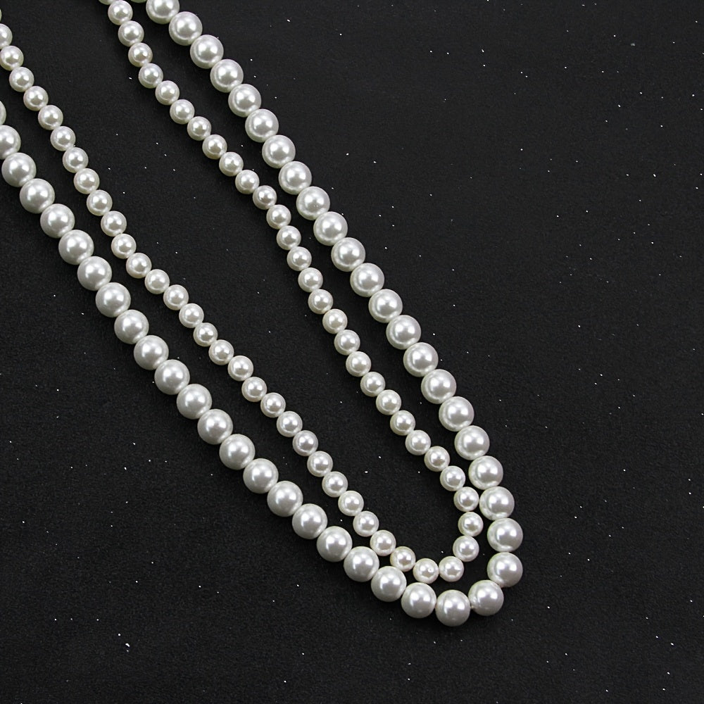 Indulge in Elegance with the JASTAR Double Strand Shell Pearl Necklace featuring 6mm and 8mm pearls, adorned with an Infinite Clasp and full zirconia inlay. Elevate your style with this luxurious fashion statement perfect for women, and with its