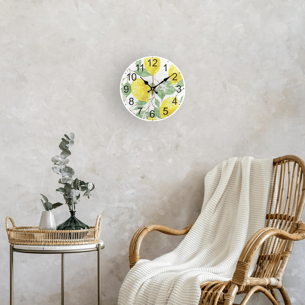 Fruit theme wall clock with golden lemon pattern design, silent non-ticking, AA battery operated. Ideal for living room and kitchen decor.