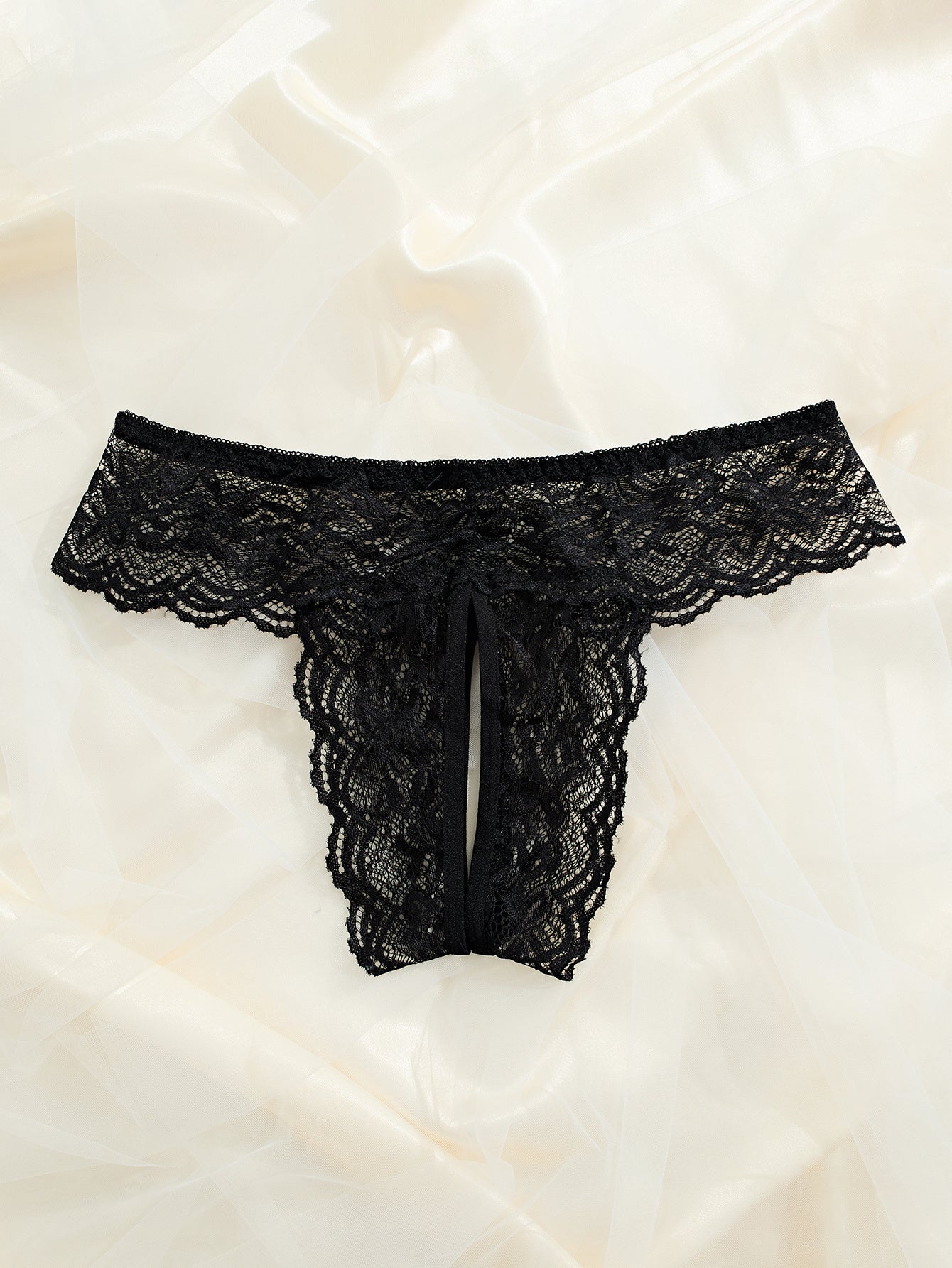 Sexy black lace panties with open crotch, low-rise design, perfect for Valentine’s Day.