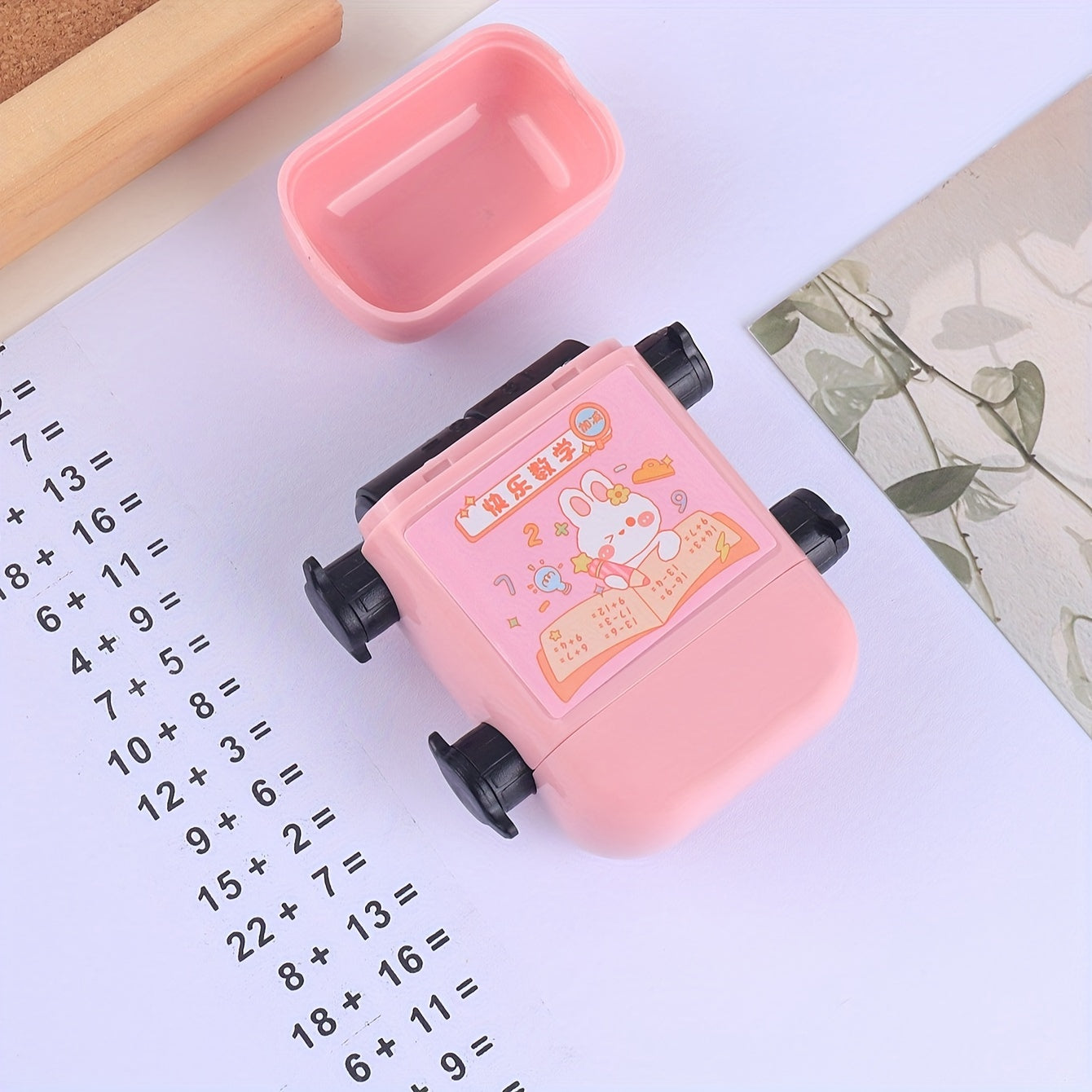 1pc Double Roller Arithmetic Stamp with addition and subtraction, cute cartoon design for math practice. Perfect for school supplies and back to school. Multiple colors available.