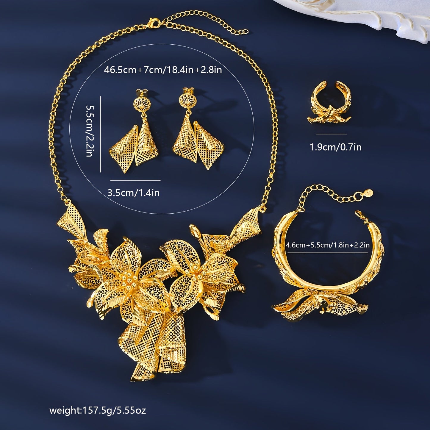 A luxurious jewelry set plated with 18K gold, showcasing a stunning floral necklace, a versatile adjustable ring, and charming pendant earrings - ideal for both everyday wear and special occasions.