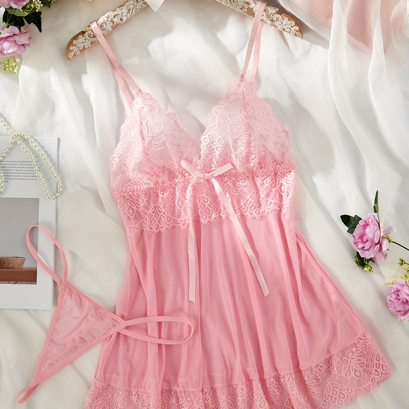 Pink lace nightgown set with satin bow detail, adjustable straps, and sheer boudoir vibe.