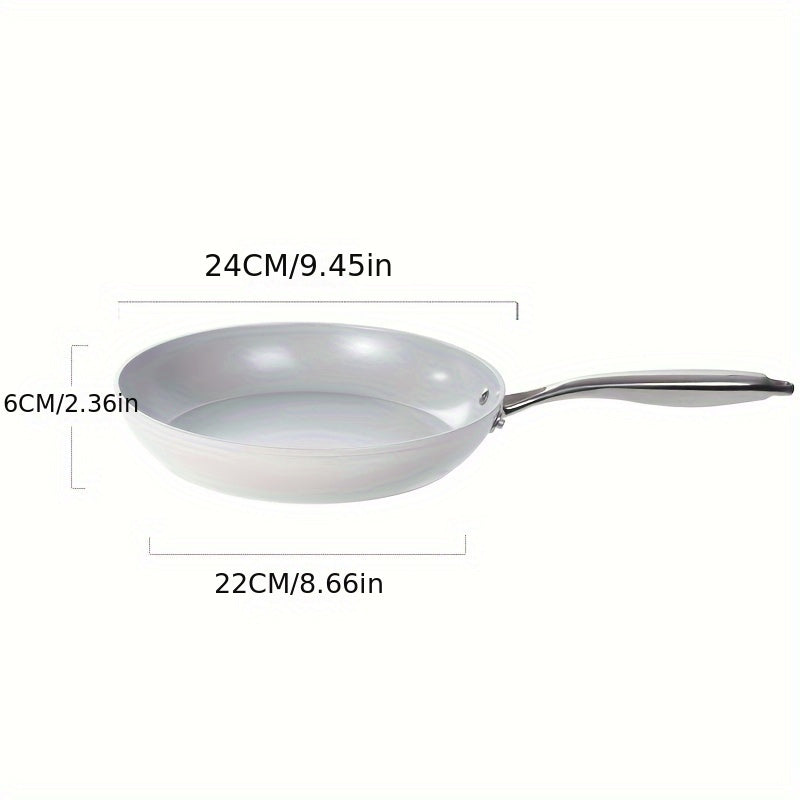 White wok pressure-proof ceramic frying pan suitable for egg steak cooking available for use on gas stove or magnetic stove. This versatile cookware is dishwasher safe and perfect for all your kitchen needs.