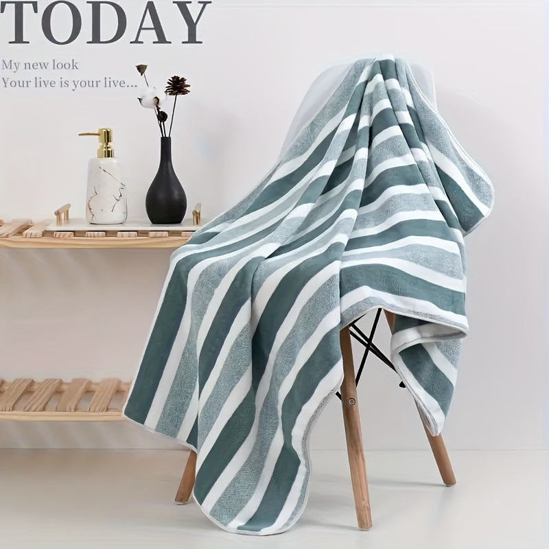 Large, soft, and super absorbent bath towel with modern striped blend design in a space theme. Made from knit fabric and quick-drying, weighing 280gsm. Ideal for adults.