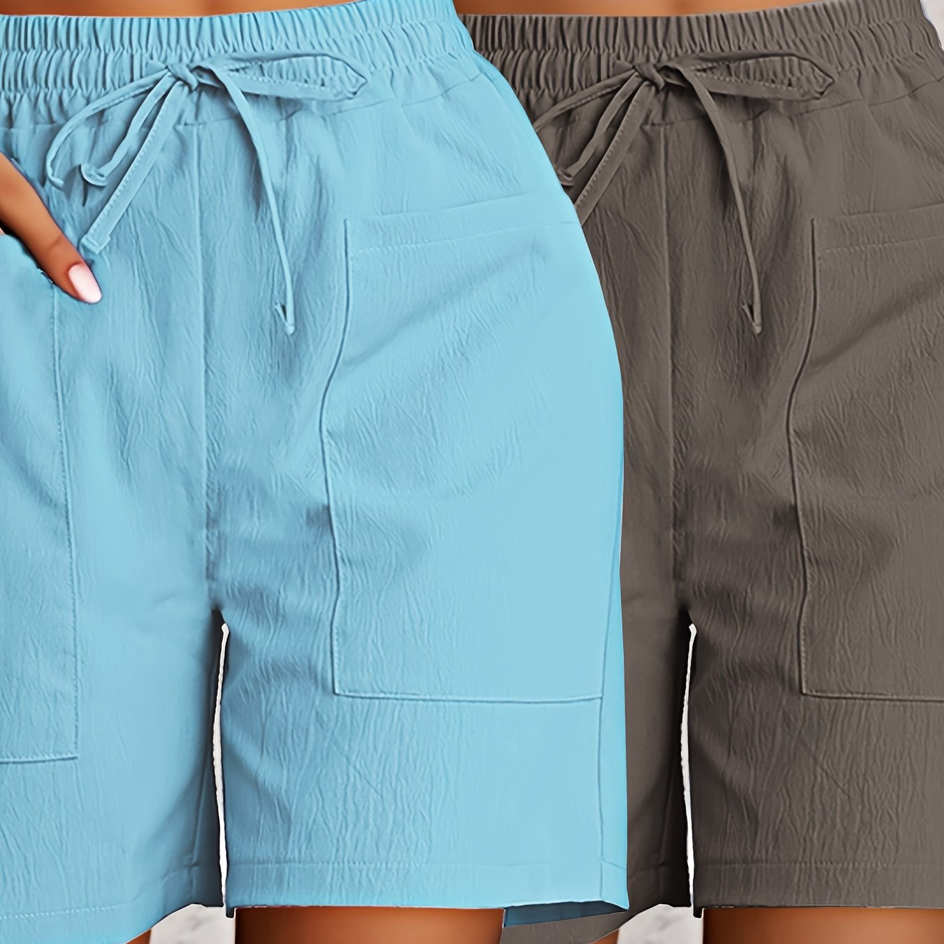 2-Pack of Women's breathable cargo shorts in solid colors. Made of lightweight polyester with dual pockets and drawstring detail. All-season fashion.