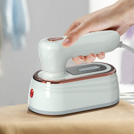 Black and white portable handheld steam ironing machine perfect for travels and dorm rooms. Quickly iron your fabric clothing and shirts on-the-go. Great as a travel gift or dorm room essential.