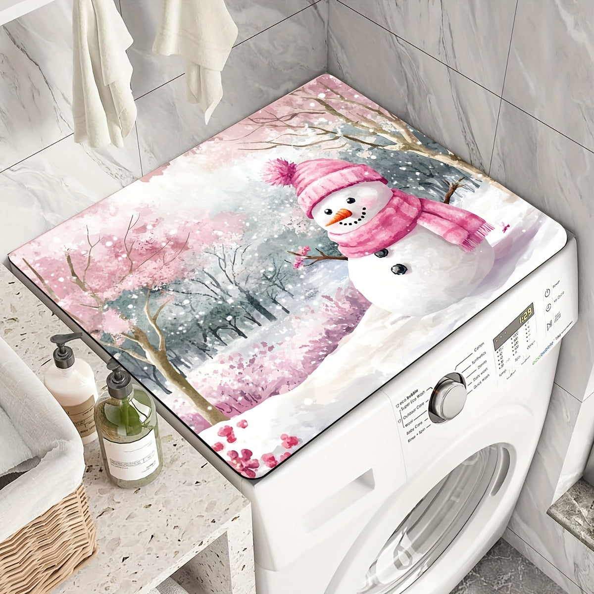 Keep your washing machine clean and festive with this 1-piece dust cover featuring a pink snowman and cherry blossom winter scene. This cover is quick-drying, absorbent, and non-slip, providing protection for your appliance and adding a decorative touch