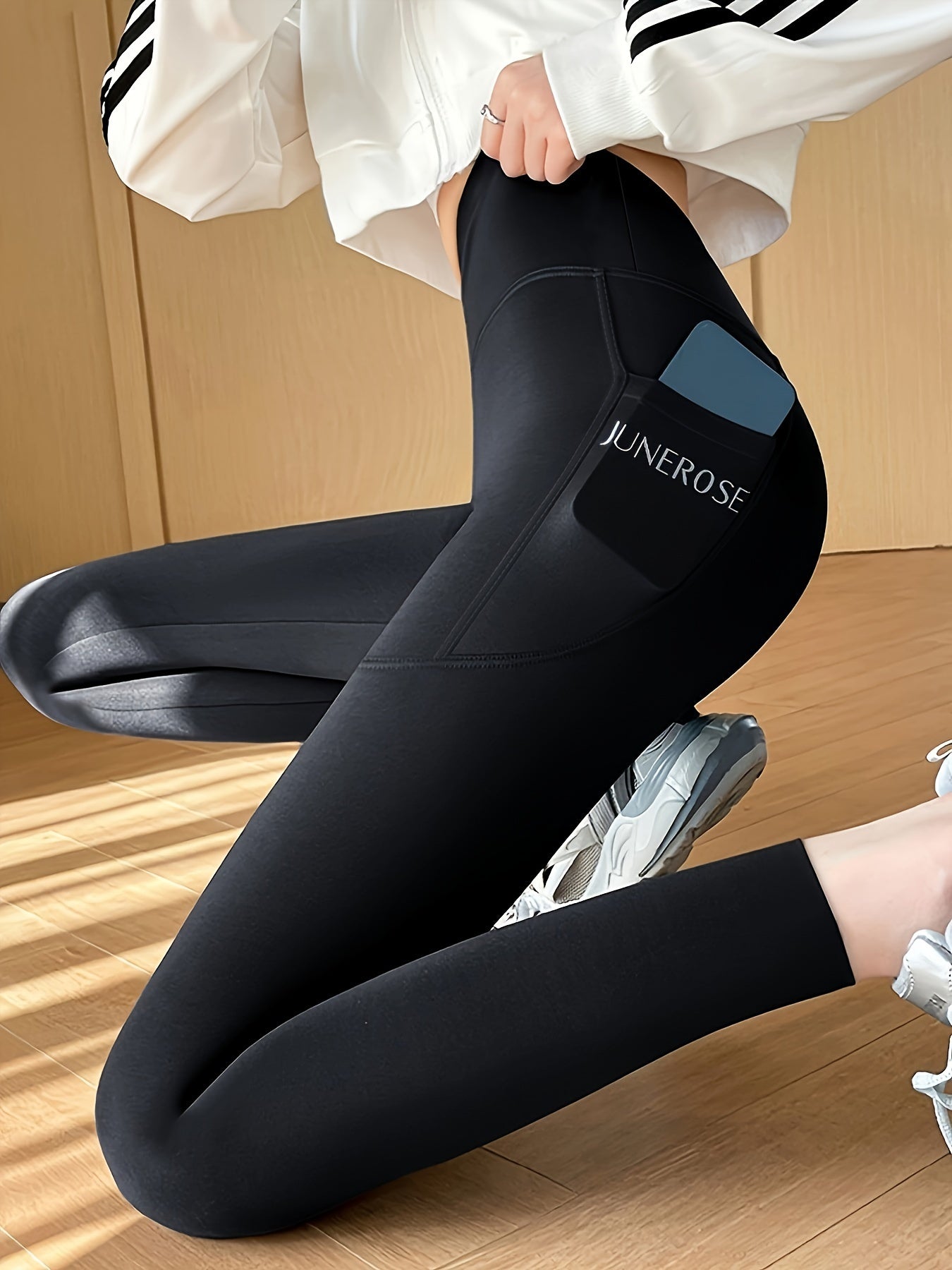 High waist compression pants with tummy control and pockets for women.