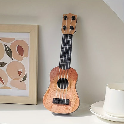 Mini playable uke instrument figurine made of plastic for home and office decor, ideal gift for music enthusiasts.