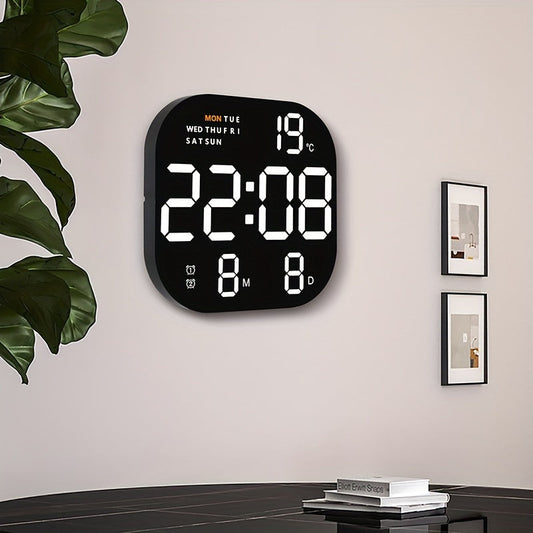 The Large LED Wall Clock features a remote control for easy operation. It has a digital display, alarm, calendar, and temperature function. The clock is powered by USB, making it convenient to use.