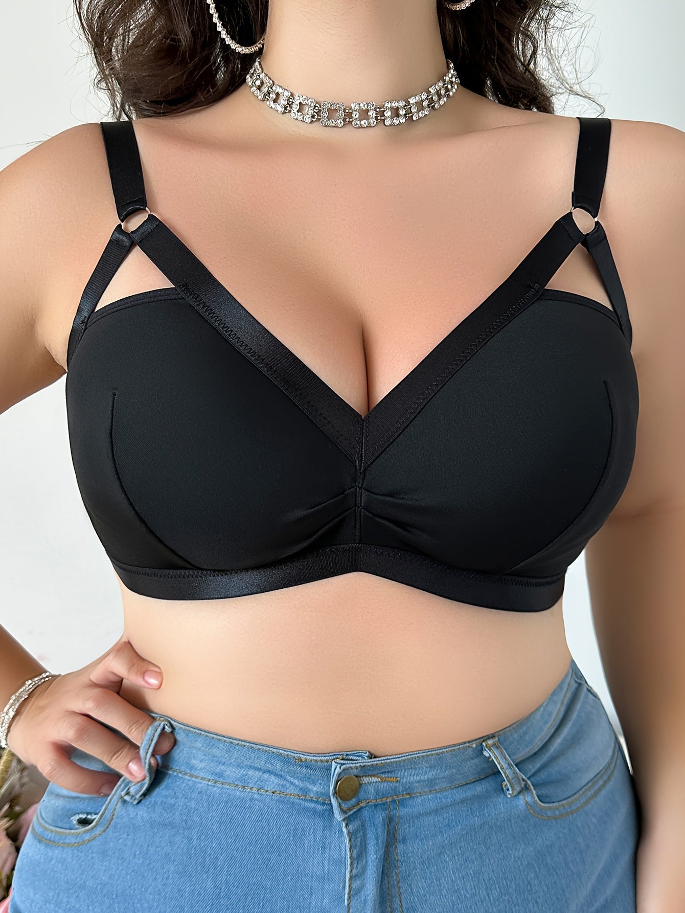 Polyester knit V-neck bralette for plus size women with medium stretch, solid color, collarless design, wire-free, and pullover style.