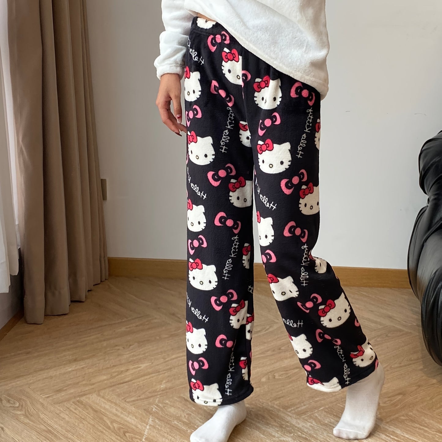 Sanrio Hello Kitty cozy flannel pajamas for women, officially licensed and perfect for relaxing and sleepwear.