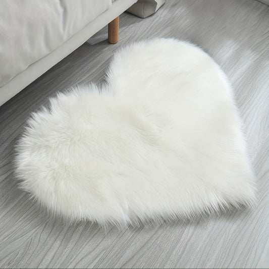 Soft and Plush Heart-Shaped Area Mat - Made with a gentle blend of Polyester and Acrylic, easily hand washable - Perfect for adding a cozy touch to your bedroom or bay window decor, or as a decorative floor mat for neutral spaces.