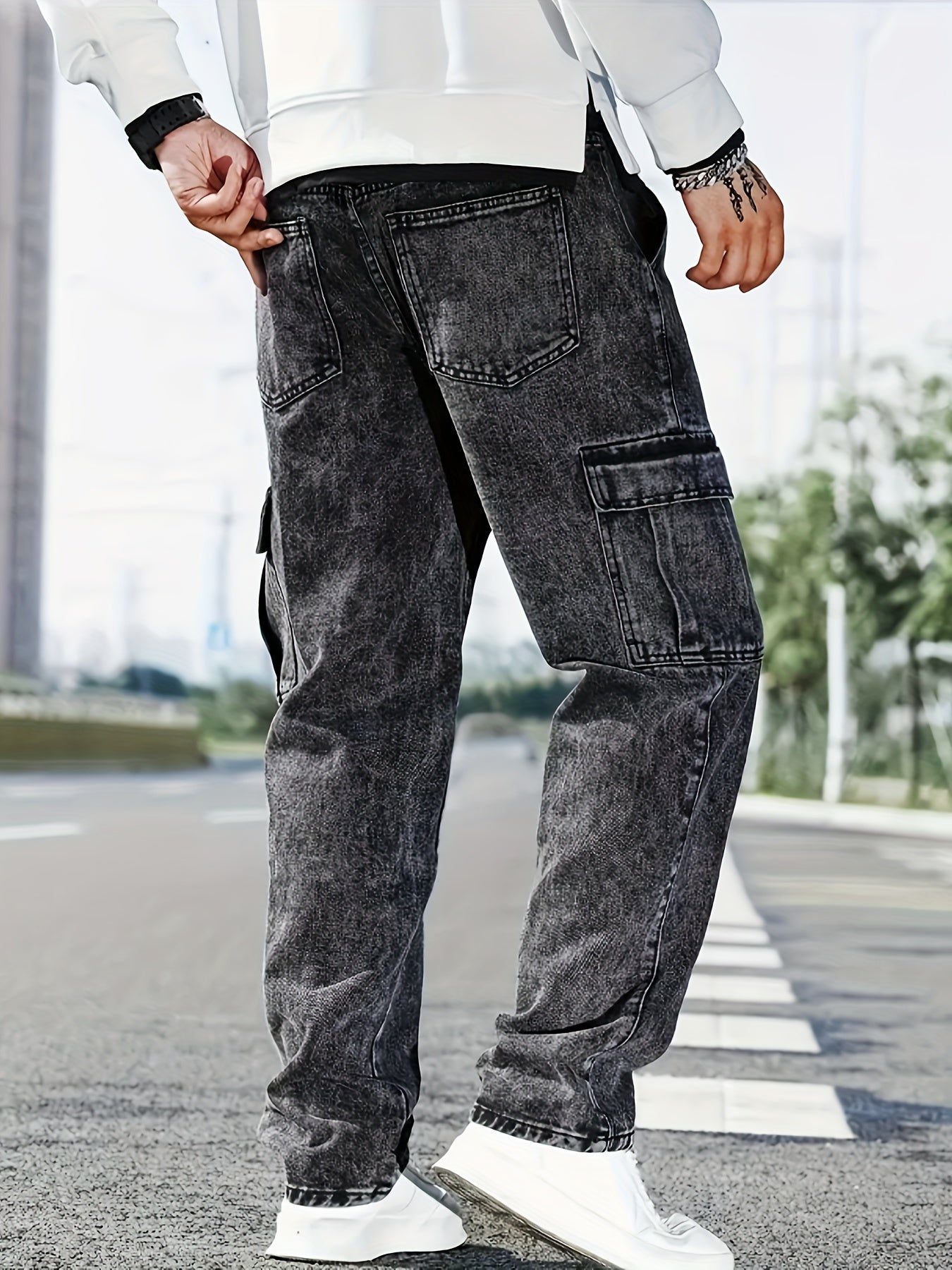 Fashionable plus size men's denim jeans with stretch fabric and multiple pockets for all-season comfort.