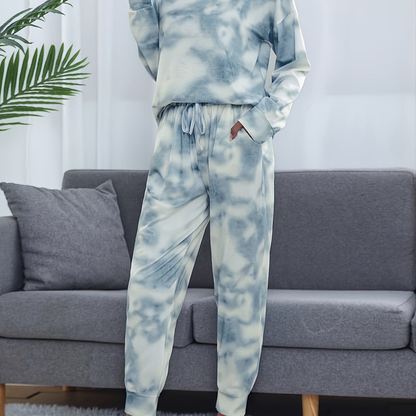 Tie dye lounge set for women, with long sleeve top and elastic waistband pants.