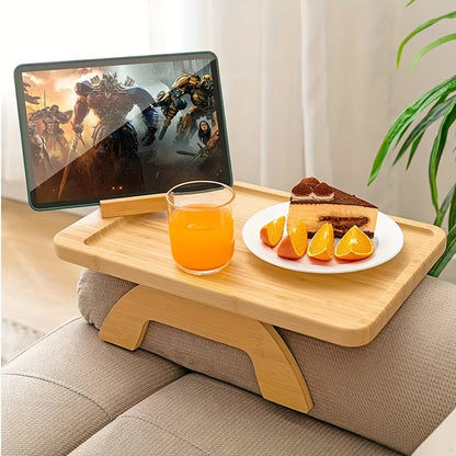 Non-slip sofa tray with phone holder and foldable armrest table, ideal for wide sofas and includes a drink holder shelf. Made of wood.