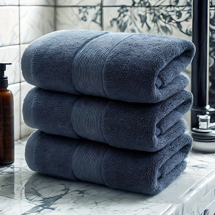 3 premium cotton velvet towels, 35.56cm x 73.66cm, soft & absorbent, hotel quality in dark blue, light beige, and gray. Ideal for bathroom or spa use.