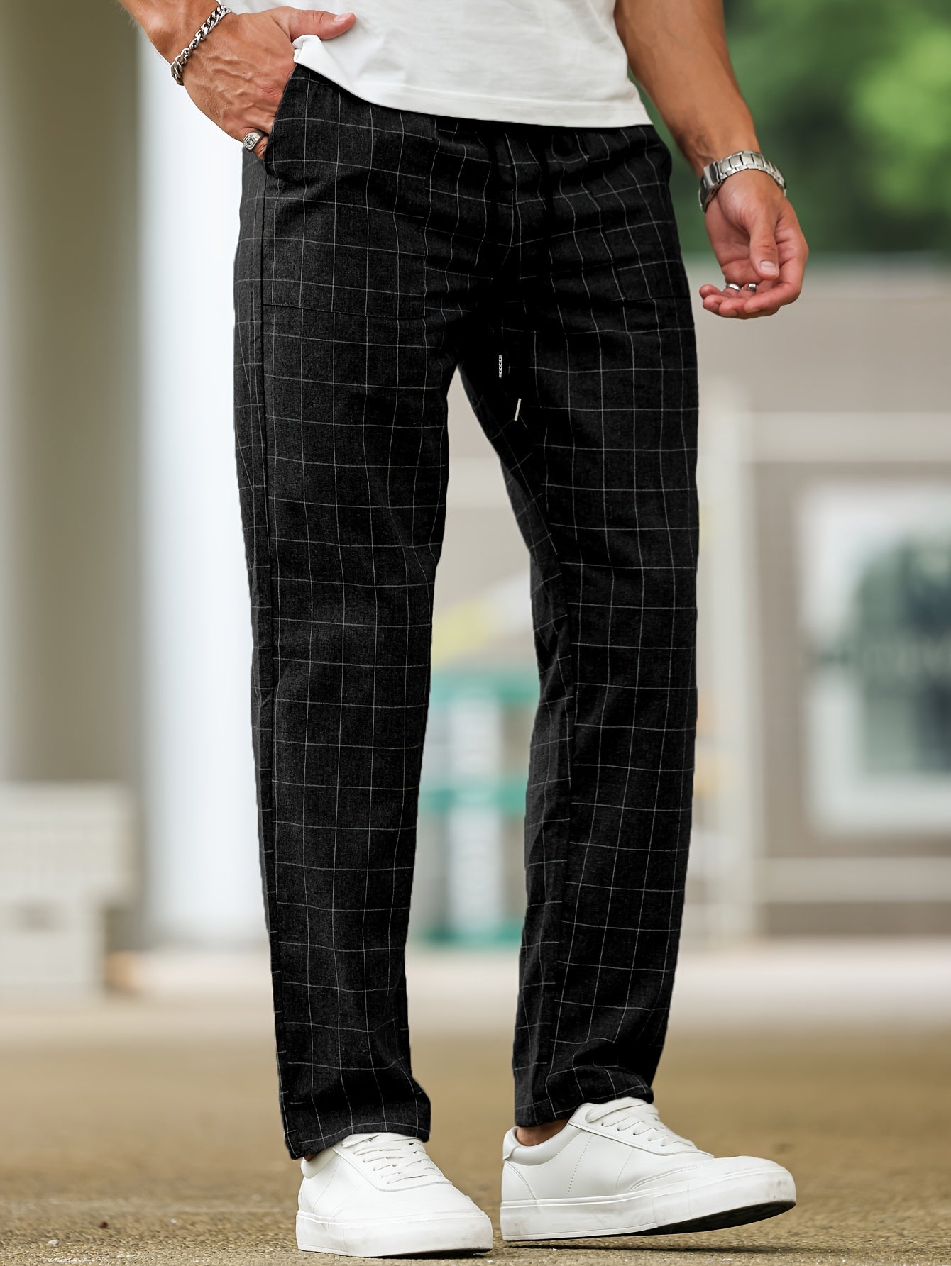 Men's polyester pants with drawstring waist, ideal for spring and fall, featuring casual striped plaid pattern.