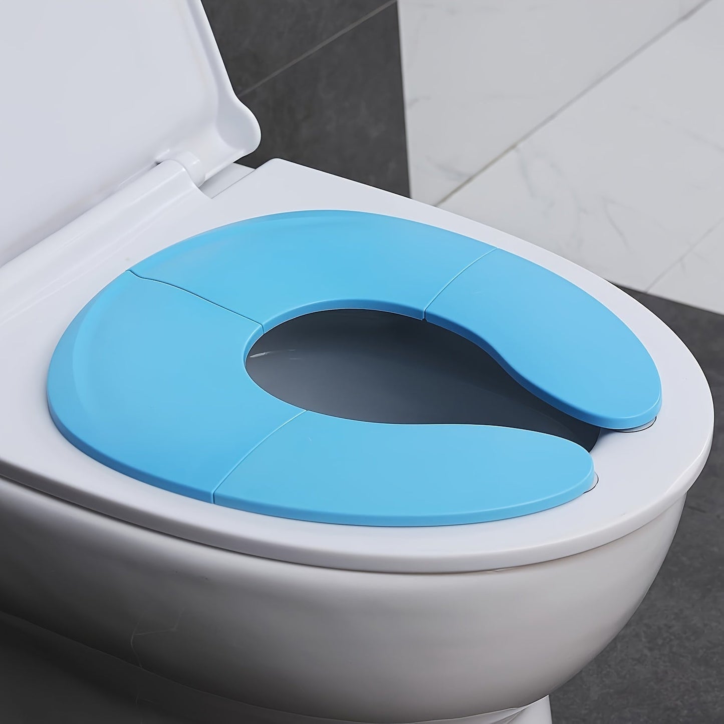 Travel Toilet Seat Cover that is Portable, Folding, and Non-Slip - Made with Easy to Clean PVC Material, Recyclable Potty Training Solution for Boys and Girls