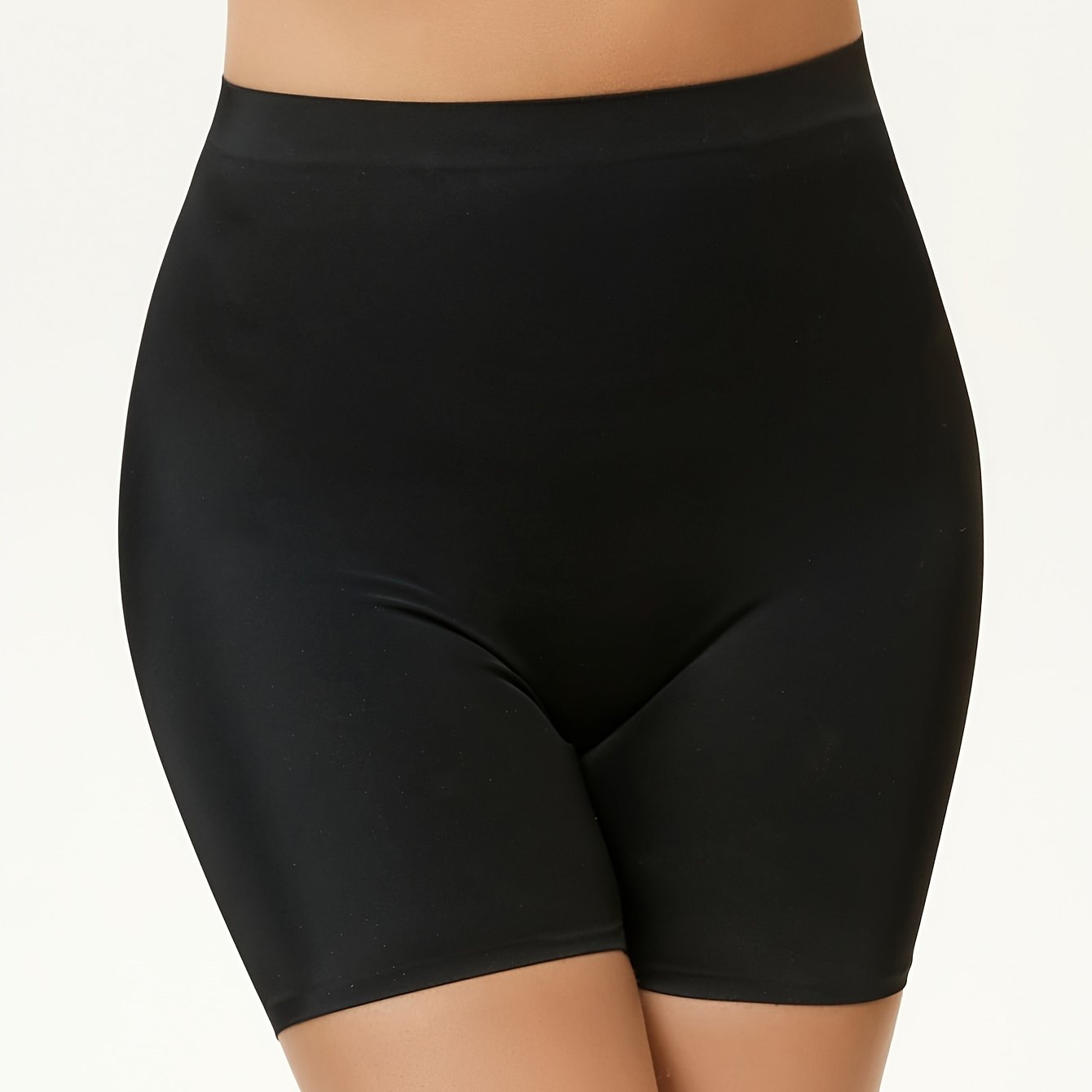 High waisted tummy control sports shorts for women that lift the butt and shape the body, made with breathable fabric.