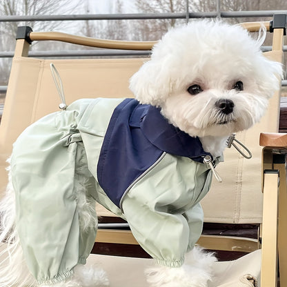 Waterproof pet raincoat with hood for small dogs and cats in light green PVC material. Features stylish two-tone design, button closure, and is hand wash only. Ideal for Teddy and Bichon