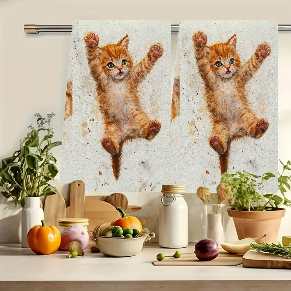 2 pieces of ultra soft kitchen towels featuring an adorable orange kitten learning to jump design. These highly absorbent and machine washable dish hand towels come in a contemporary style measuring 40.64x60.96 cm. Perfect for holiday decor, these dish