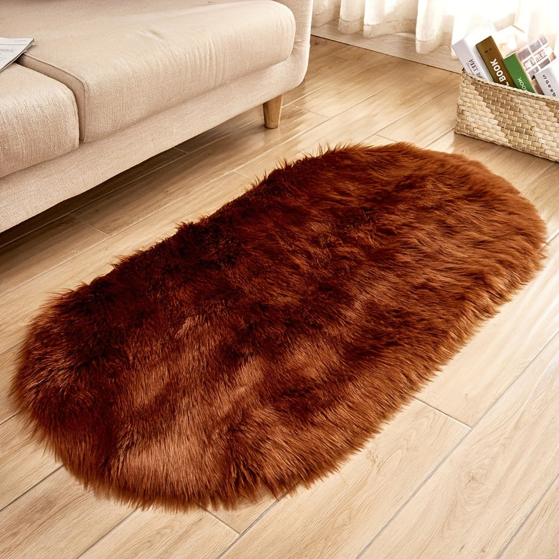 One piece of a luxurious Super Soft Area Rug, featuring a Plush Fluffy Faux Sheepskin design in an Oval shape, perfect for adding warmth to your Living Room or Bedroom. This Machine Washable Bedside Rug is made of Shaggy Plush Carpet Faux material, ideal