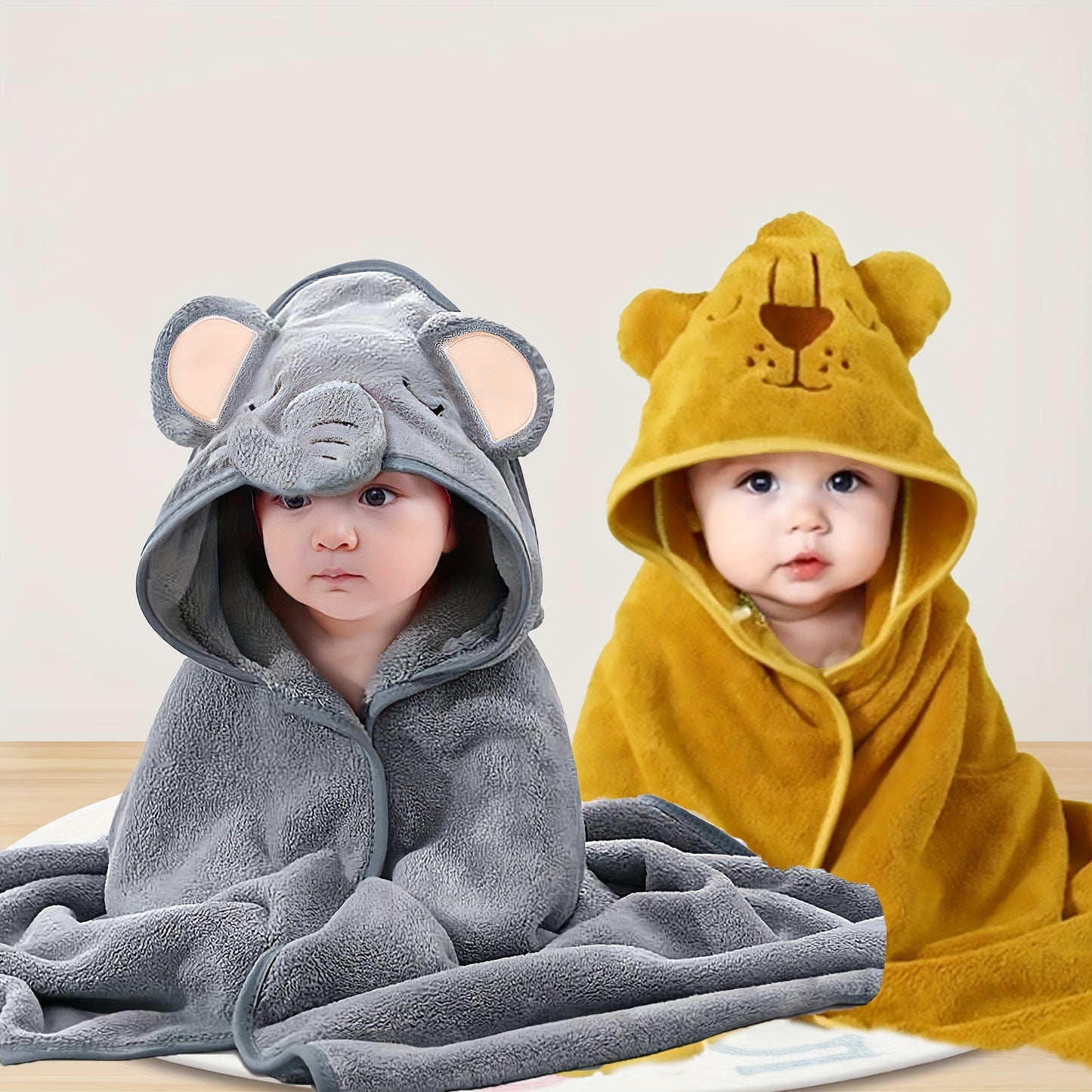 2 Youngsters' cartoon hooded bath towels: Soft, absorbent, and versatile for beach, swimming, and home use.