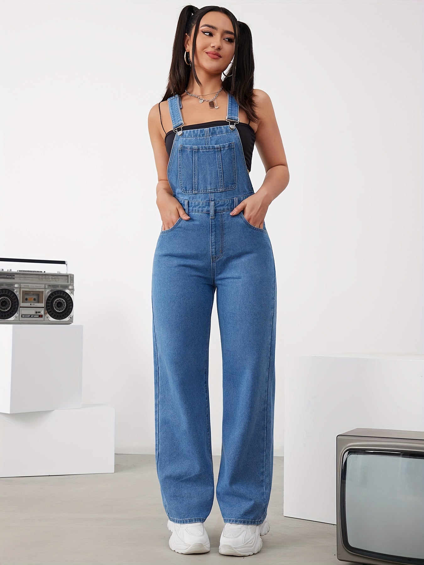 Women's adjustable denim overalls with wide-leg jeans, button detail, and machine washable.