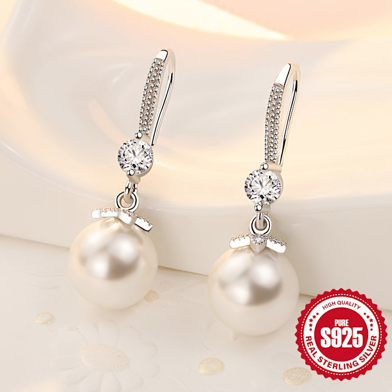 Stylish and hypoallergenic, these S925 sterling silver pearl earrings feature a minimalist design with a touch of sophistication, weighing 6.95g.