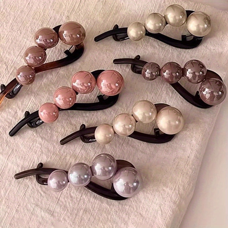 Stylish imitation pearl twist hairpin for daily wear and styling.