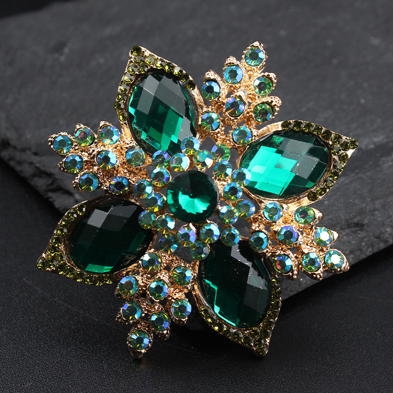 Luxurious Fashion Accessory: Vintage Green Rhinestone Flower Brooch with Baroque Elegance, Quadrangular Cross Design, and Irregular Shape