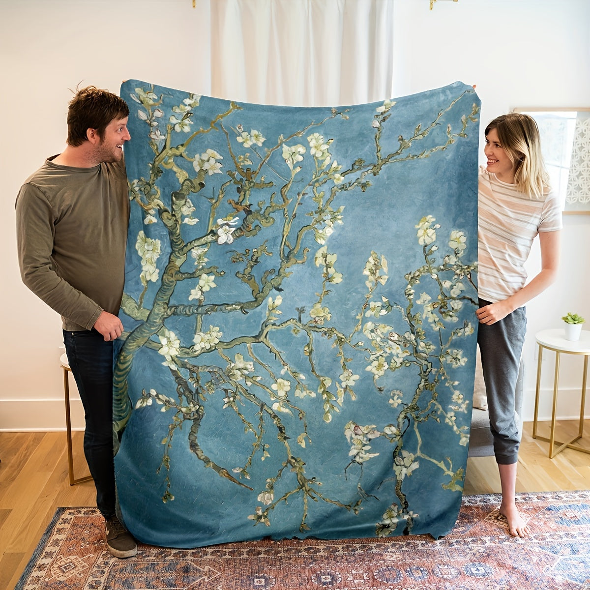 Almond Blossom Pattern Flannel Blanket - Soft and Warm, Perfect for All Seasons

This versatile blanket is ideal for use in the office, while camping, or while traveling. It makes a great gift for anyone who loves to stay cozy and comfortable.