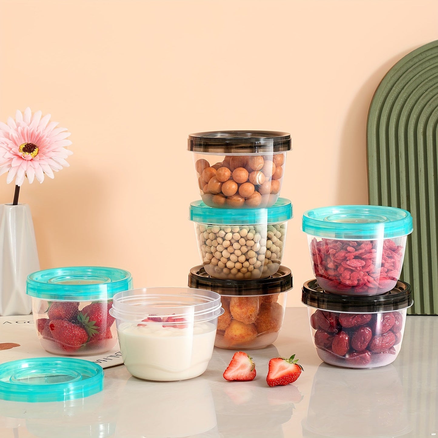 Two pieces of transparent food storage containers with blue lids - microwave safe and freshness preserving round boxes for storing grains, nuts, fruits, and more - perfect for use in home kitchens.