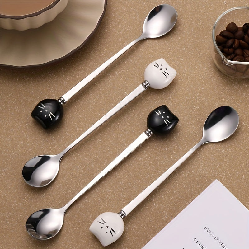 Charming stainless steel coffee stirrers with whimsical ceramic kitty spoons.