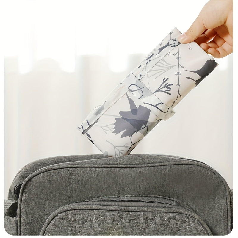 Lightweight and waterproof, this foldable diaper changing pad is perfect for traveling with your little one. Stay prepared for on-the-go diaper changes with this portable and compact changing mat.